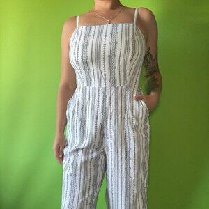 7/8 length linen jumpsuit with striped boho design, adjustable straps, elastic